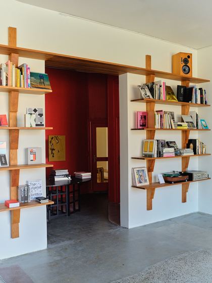 Shelves framing the doorway through to the Red Room
